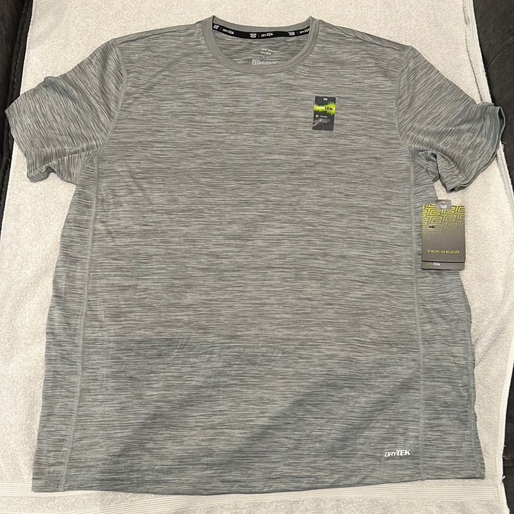 Never worn with tags Mens size large gray Athletic short sleeved shirt.